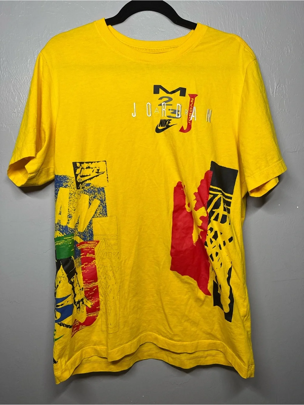 Jordan Short Sleeve Graphic Tee - Yellow with Red, Black, Blue Accents